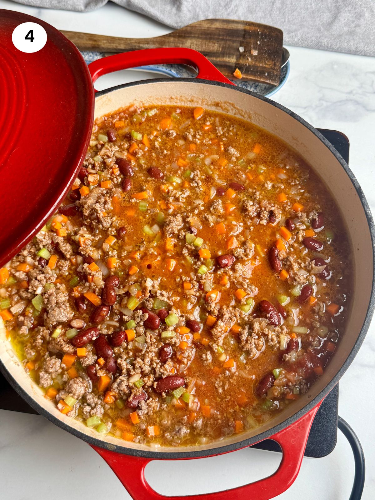 Added the tomatoes and seasoning.