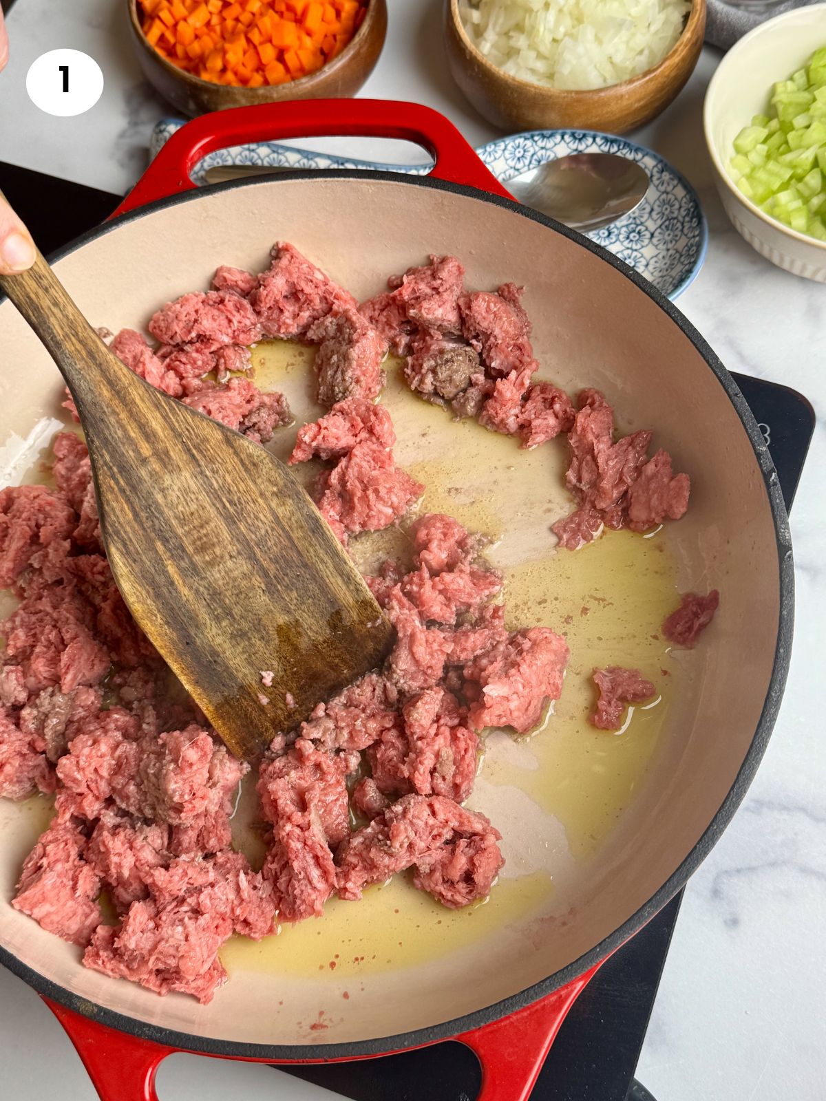 Browning the ground beef.