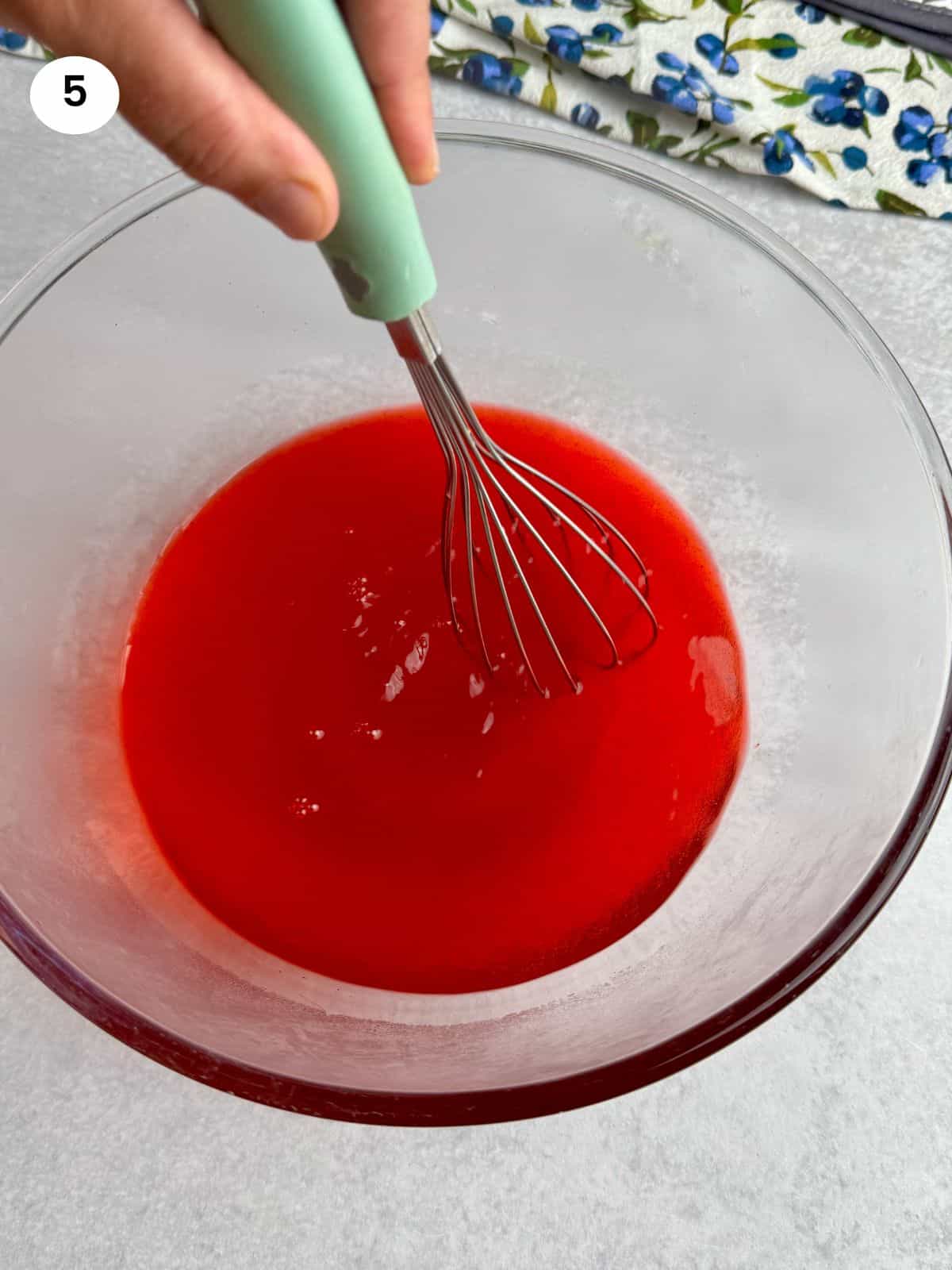 Making the jelly in a bowl.