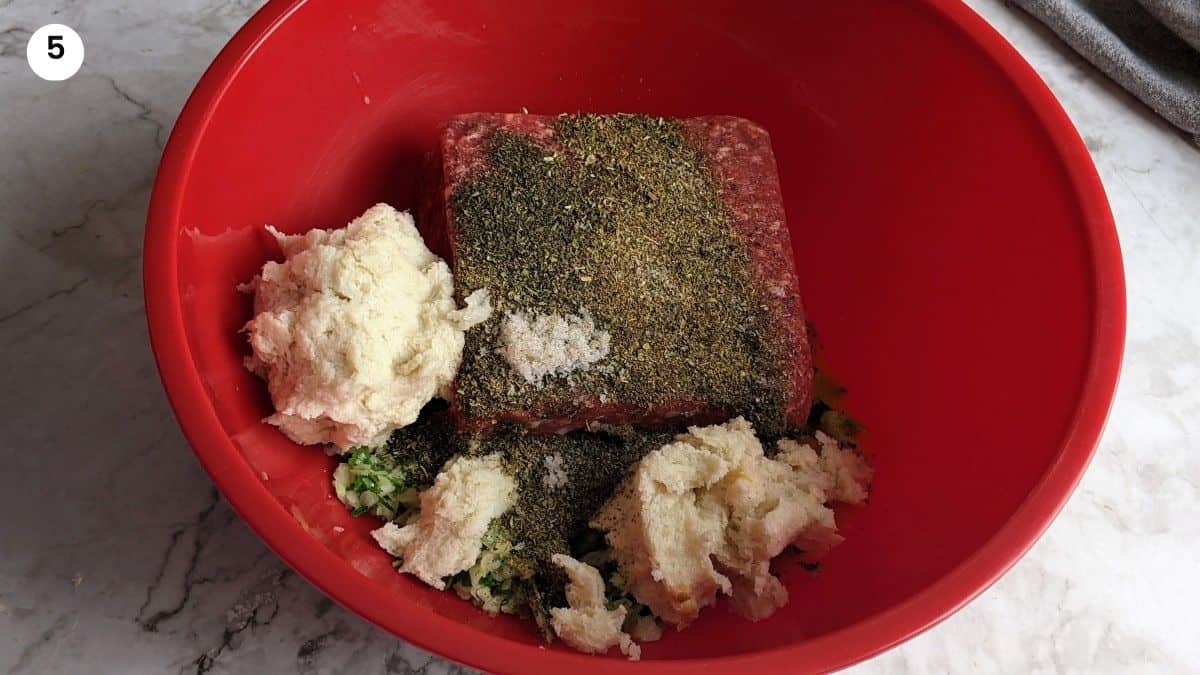 Adding the bread with the rest of the ingredients.