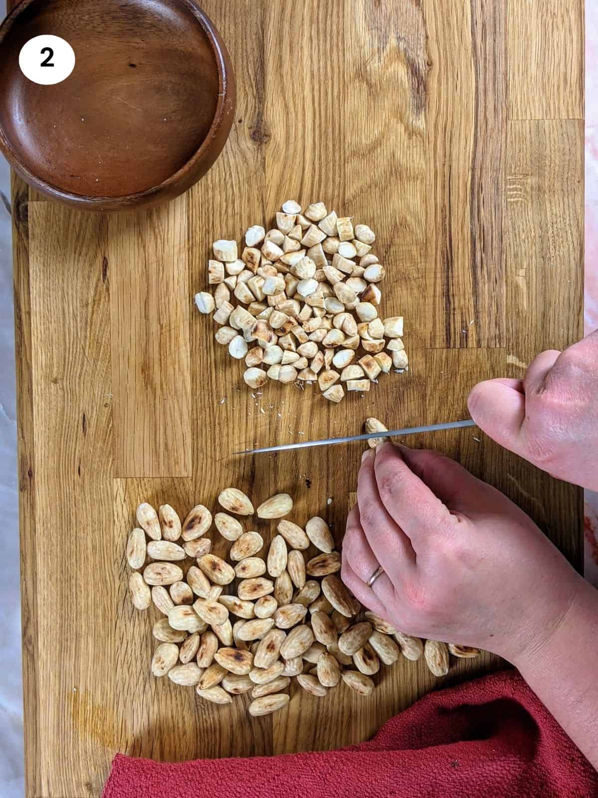 Cutting the almonds into smaller chunks.