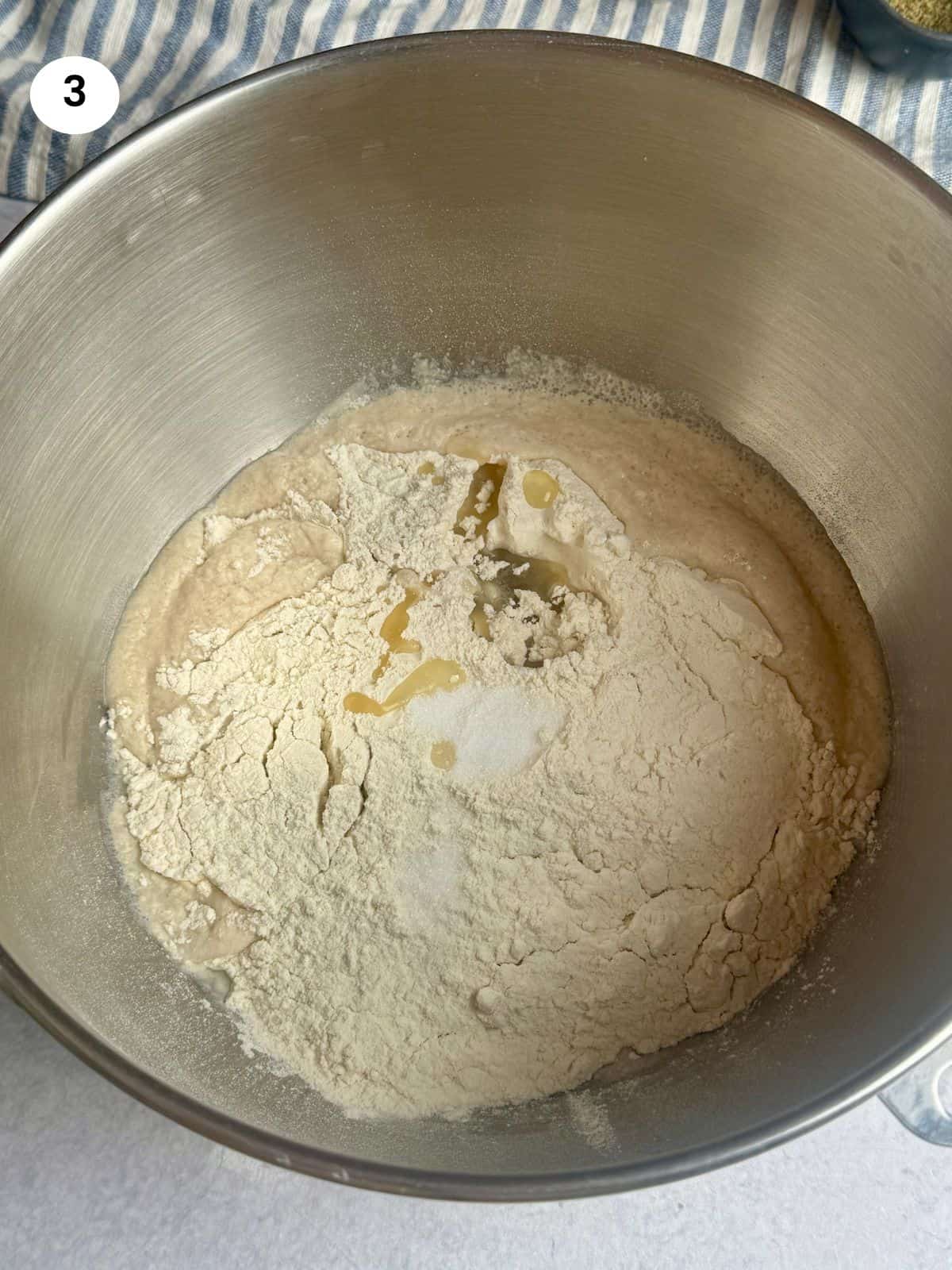Added the flour, salt and oil to the bowl.