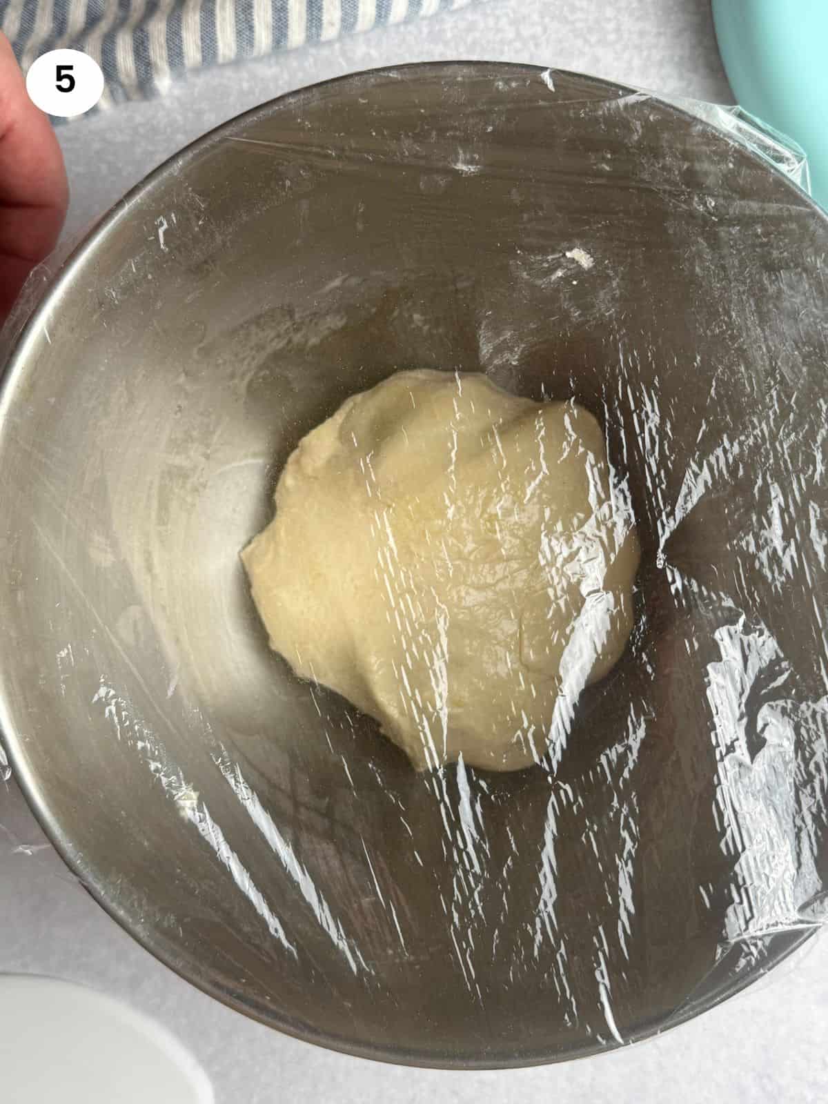 Dough inside bowl before rise.
