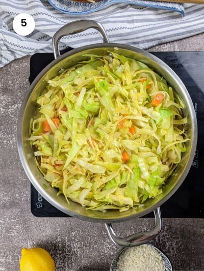 Cooked vegetables in the pot.