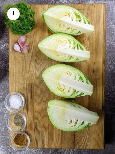 Cutting the head of cabbage into four.