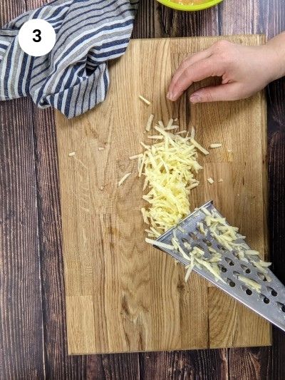 Grating apple for the rock cakes mixture.