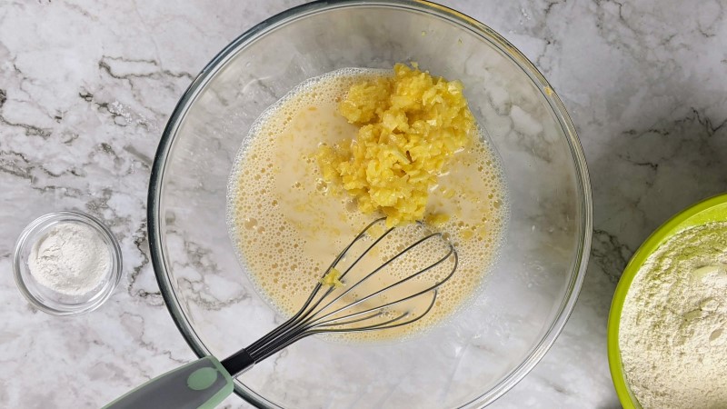 Wet ingredients added to a bowl ready to be mixed.