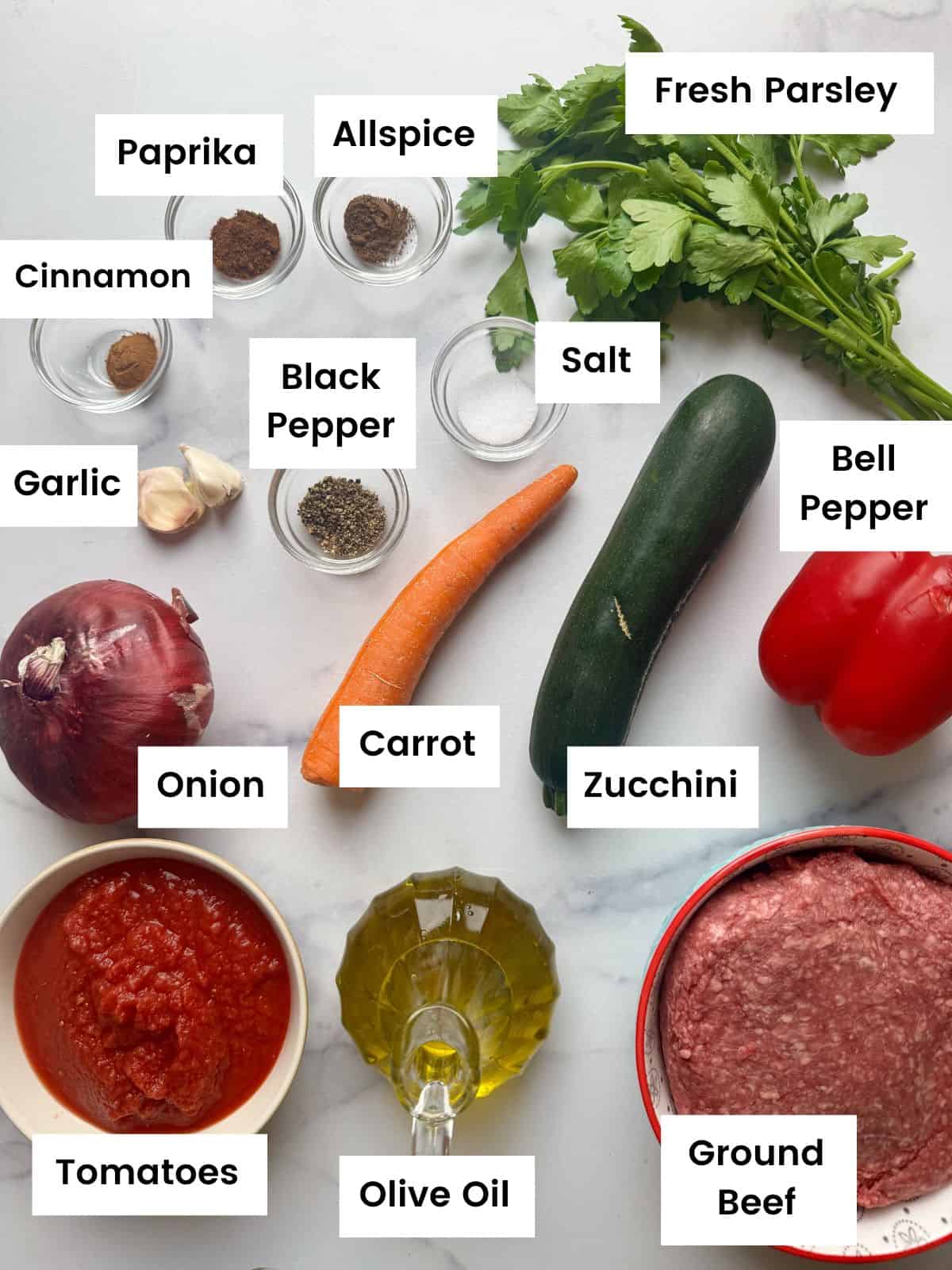 Ingredients for ground beef and vegetables skillet dish Ingredients for ground beef and vegetables skillet dish.