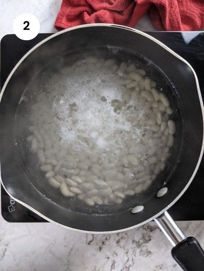 Boiling the beans in water