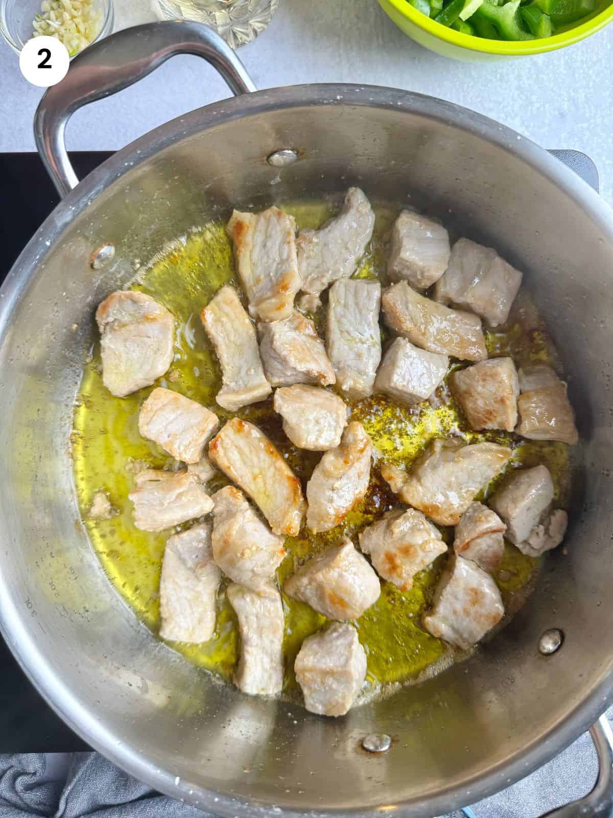 Pork chunks sauted in the pot before adding the rest of the ingredients.