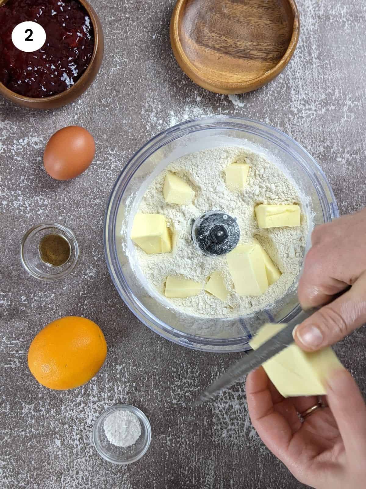 Adding the cold butter cut into cubes.