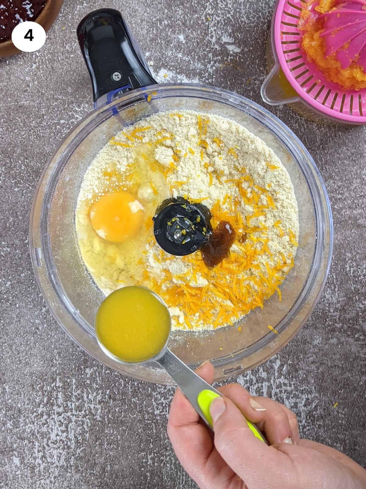 Adding orange juice to the mixture.