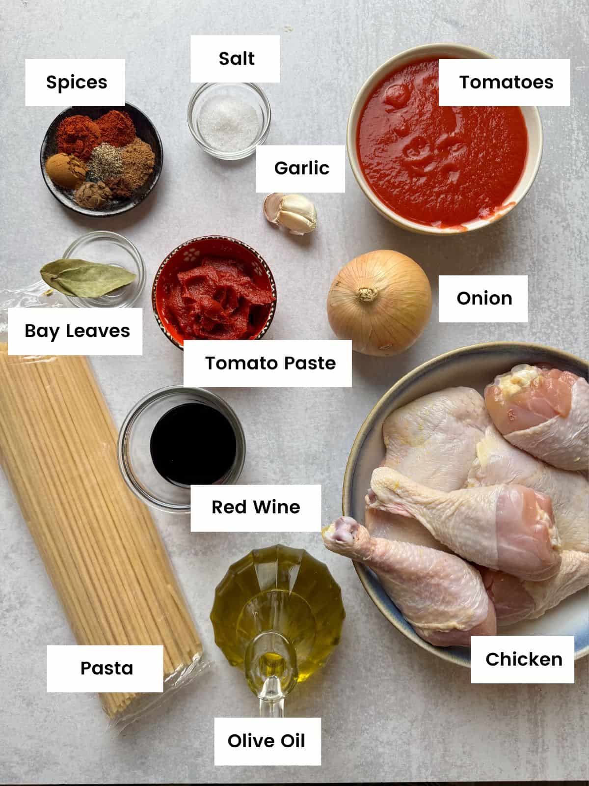 Ingredients for Greek chicken and pasta dish.