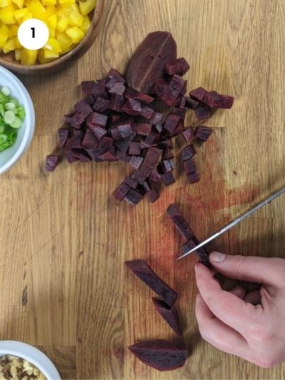 Cutting the cooked beetroot into cubes.