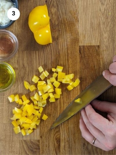 Cutting the bell pepper into cubes
