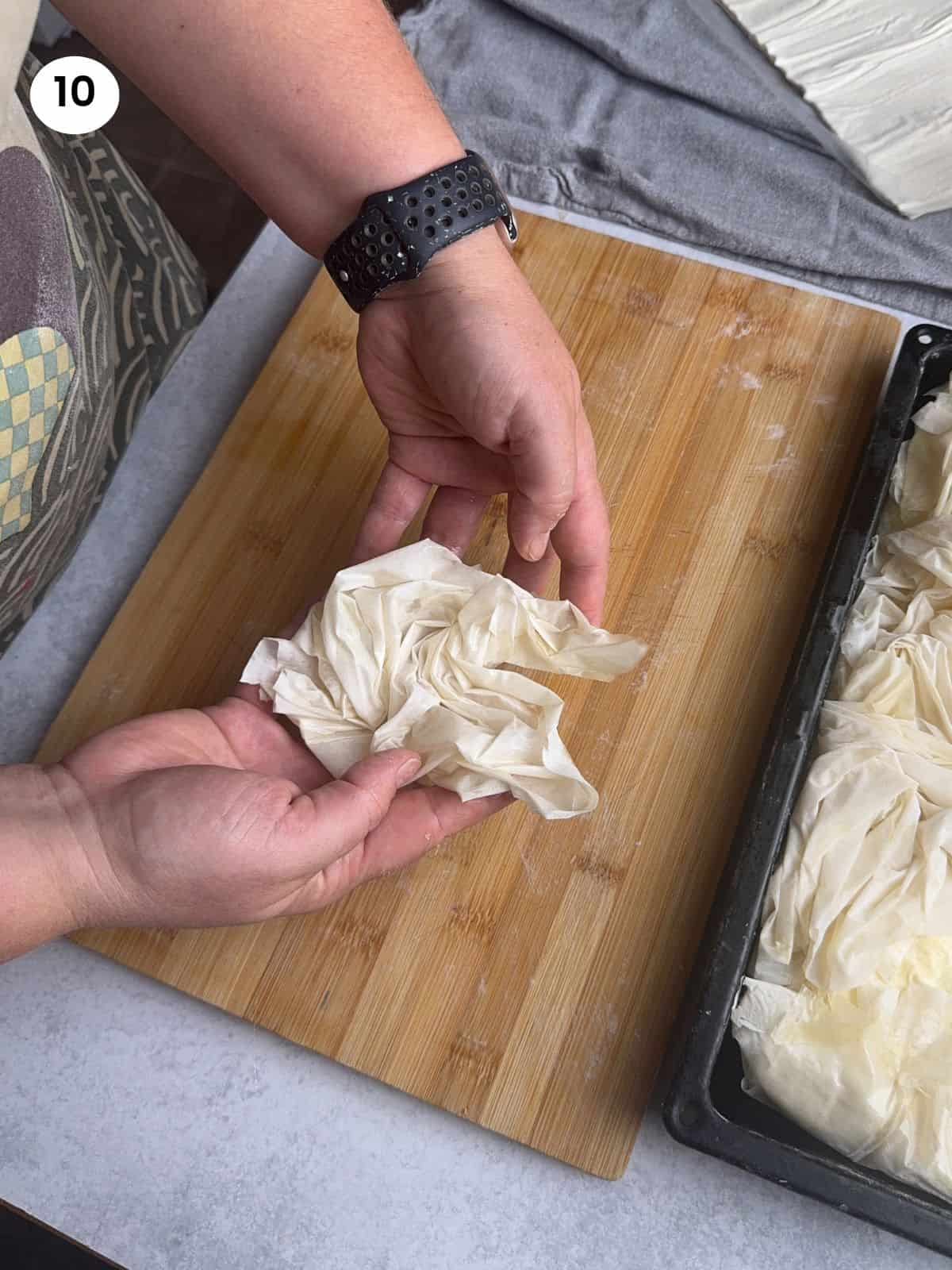 Phyllo folded and ready to go in the tray.