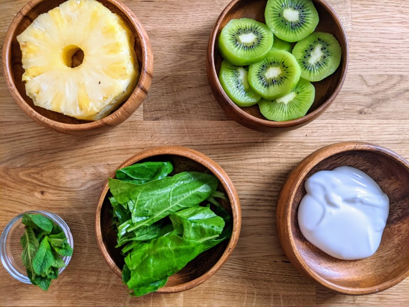 Chopped ingredients for pineapple & kiwi & spinach smoothie.