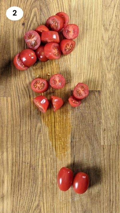 Slicing cherry tomatoes.