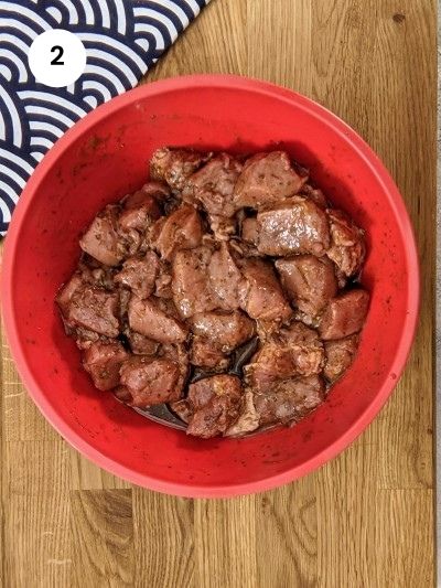 Pork cubes in marinade sauce.