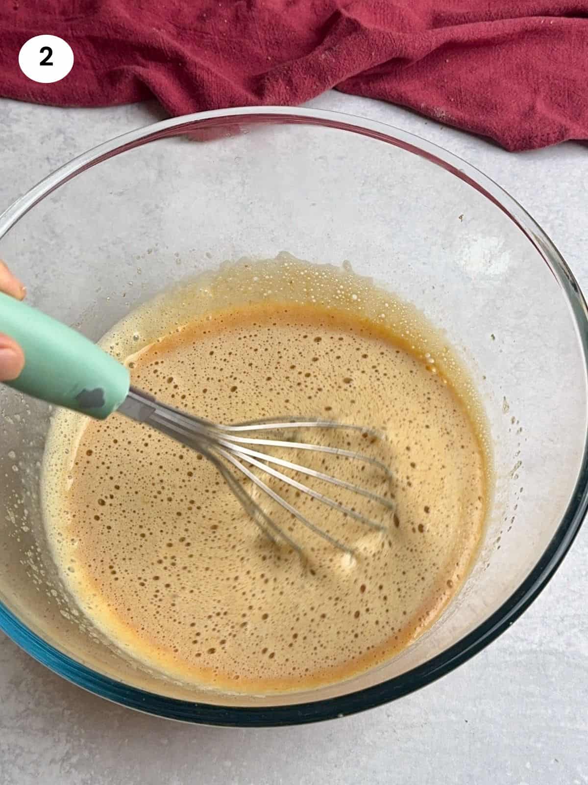 Mixing after adding the rest of the ingredients for the custard.