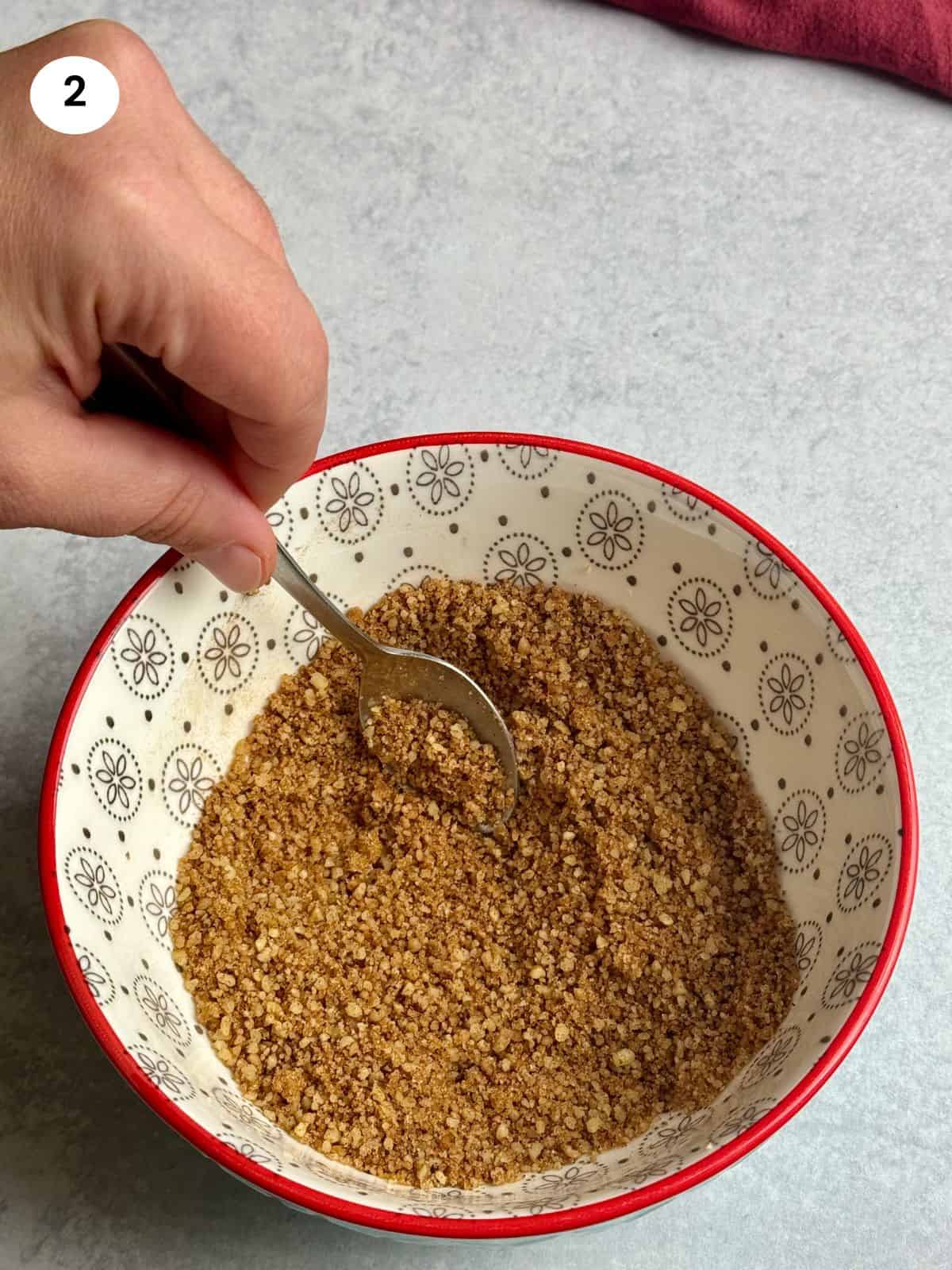 Mixing the nuts and spices for the phyllo.
