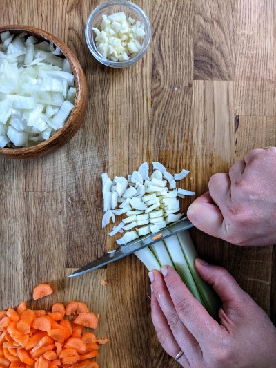 Chopping the leek into slices.
