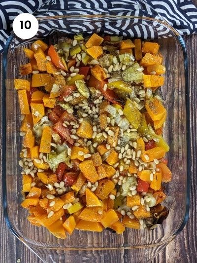 Cutting the roasted peppers into squares.