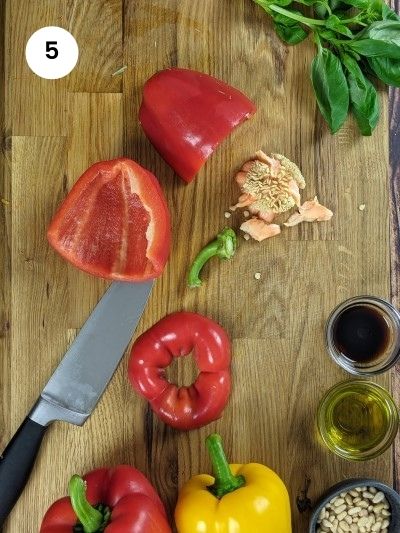 Cutting the peppers and removing the seeds.