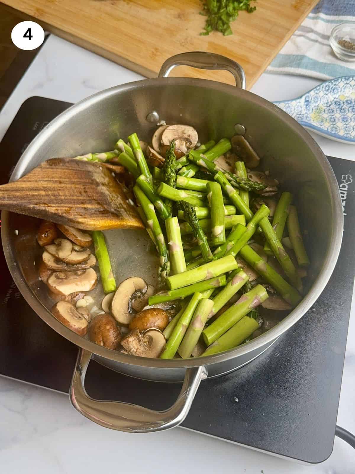 Added asparagus to the pan.