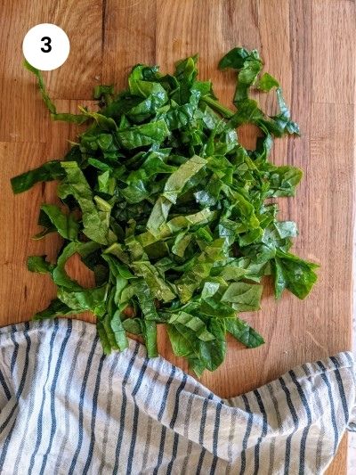 Chopped fresh spinach for the muffins.