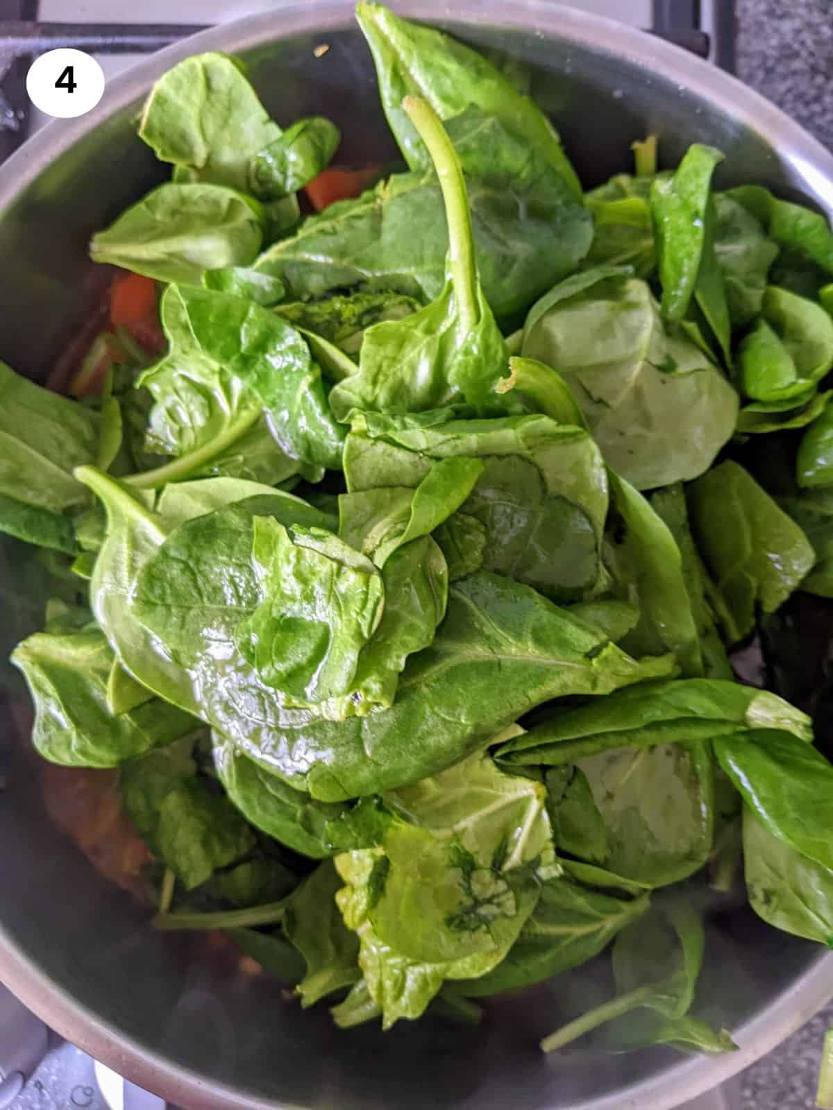 Added the spinach to the pot.