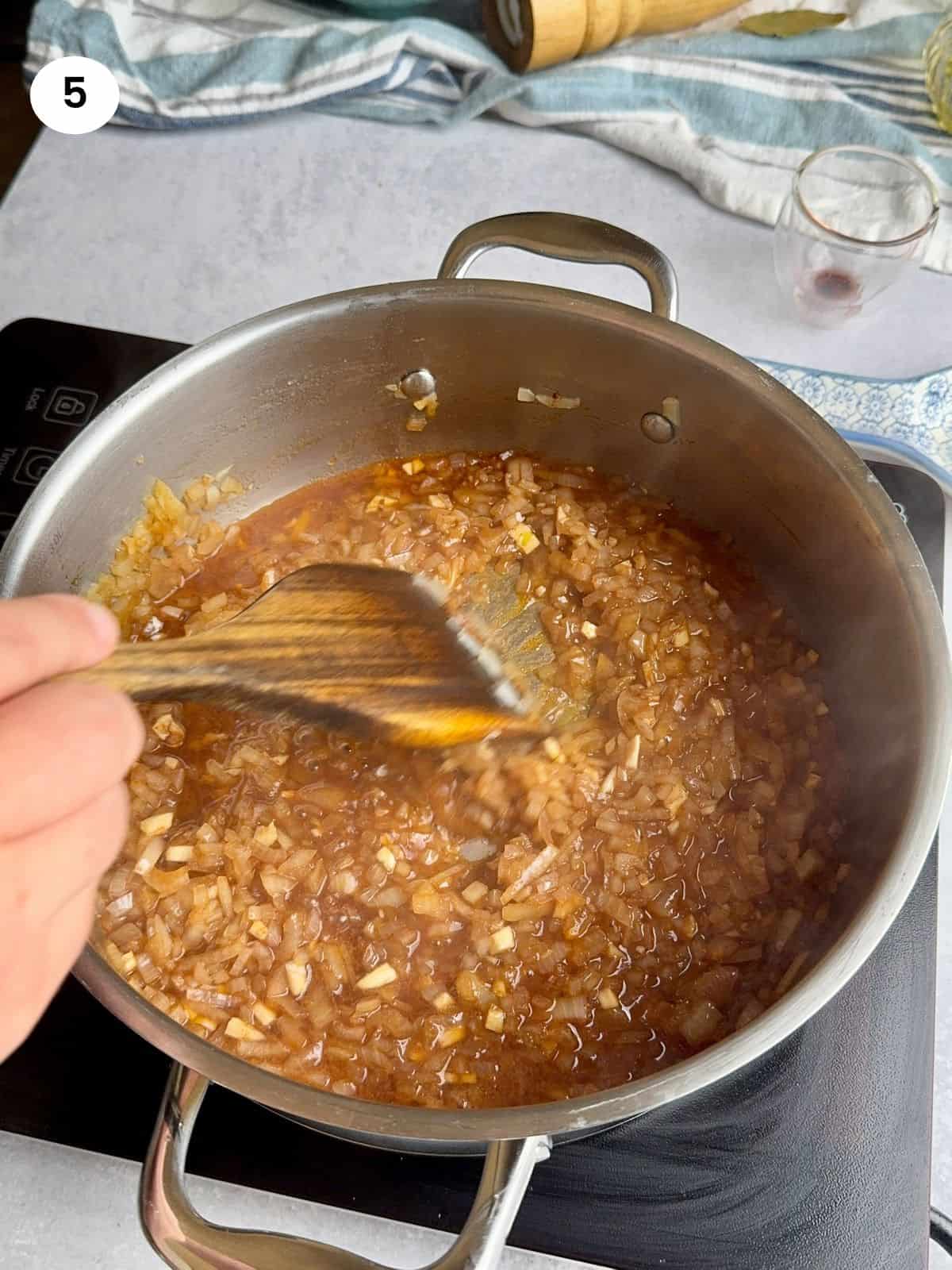 Added paprika and wine to the pot.