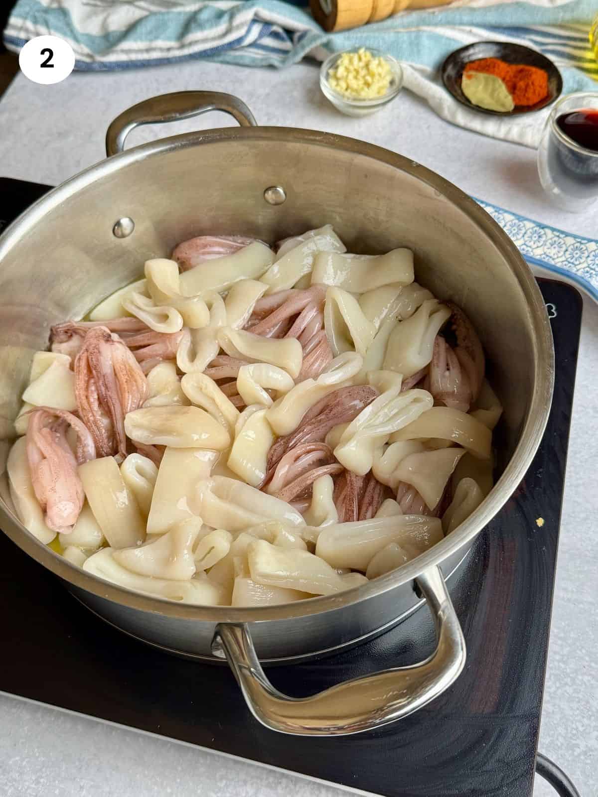 Braising the calamari.
