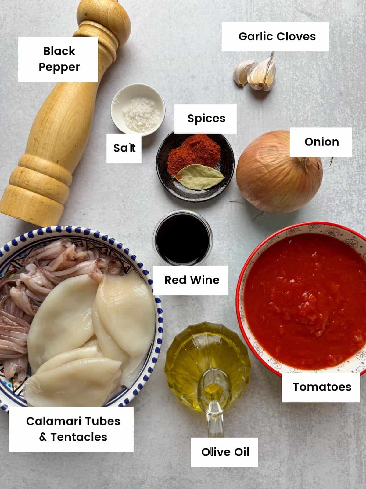 Ingredients for braised squid in tomato sauce.