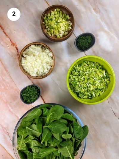 Preparing all the vegetables and herbs.