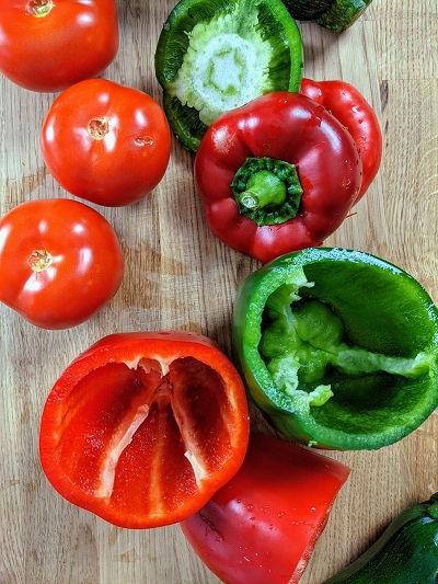 Cut the top from the peppers to stuff them.