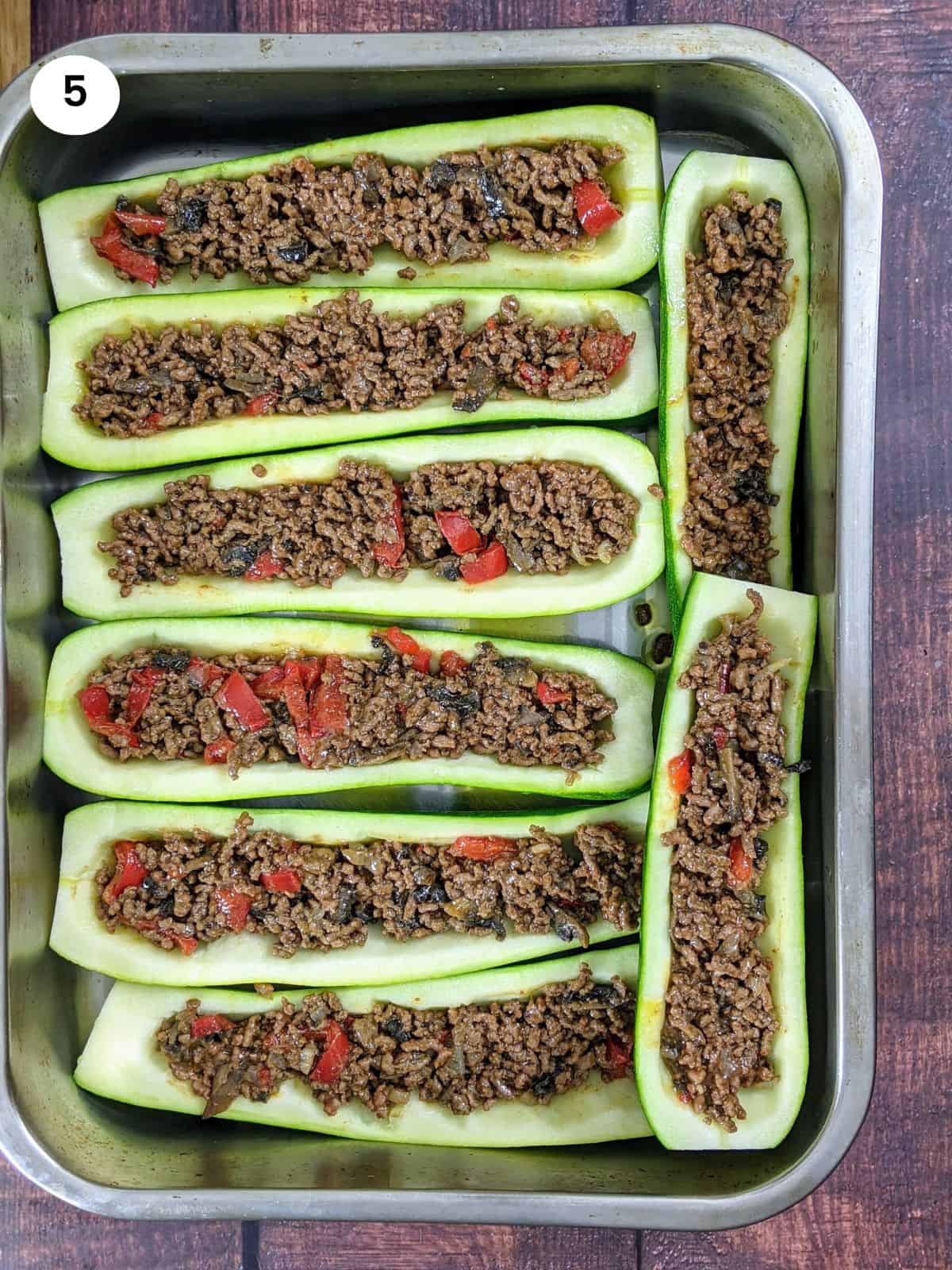 Stuffed zucchini boats with ground beef filling.