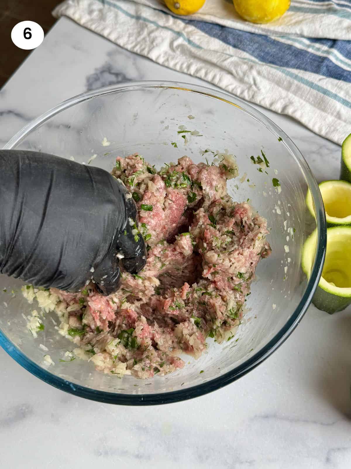 Mixed ground meat for stuffing the zucchini.