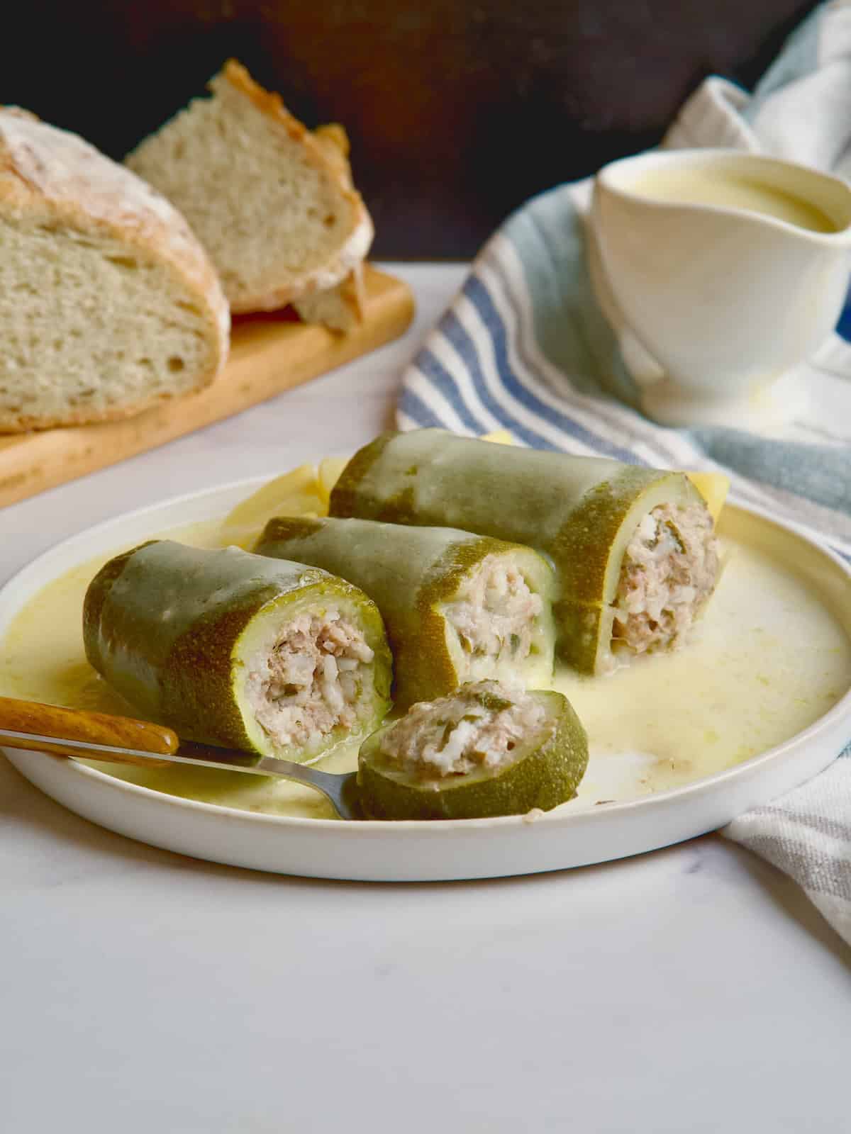 Greek Stuffed Zucchini With Egg Lemon Sauce.