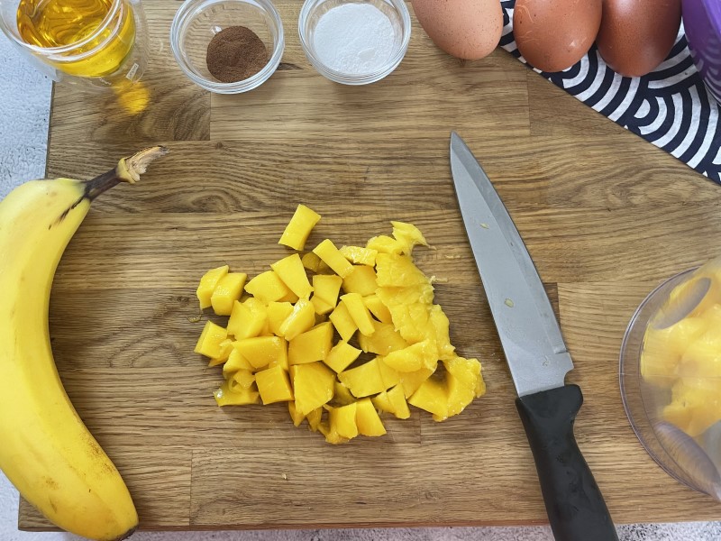 Half mango chopped to use in mango bread mixture.