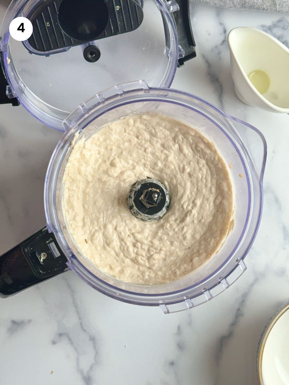 Taramosalata is blended in the food processor.