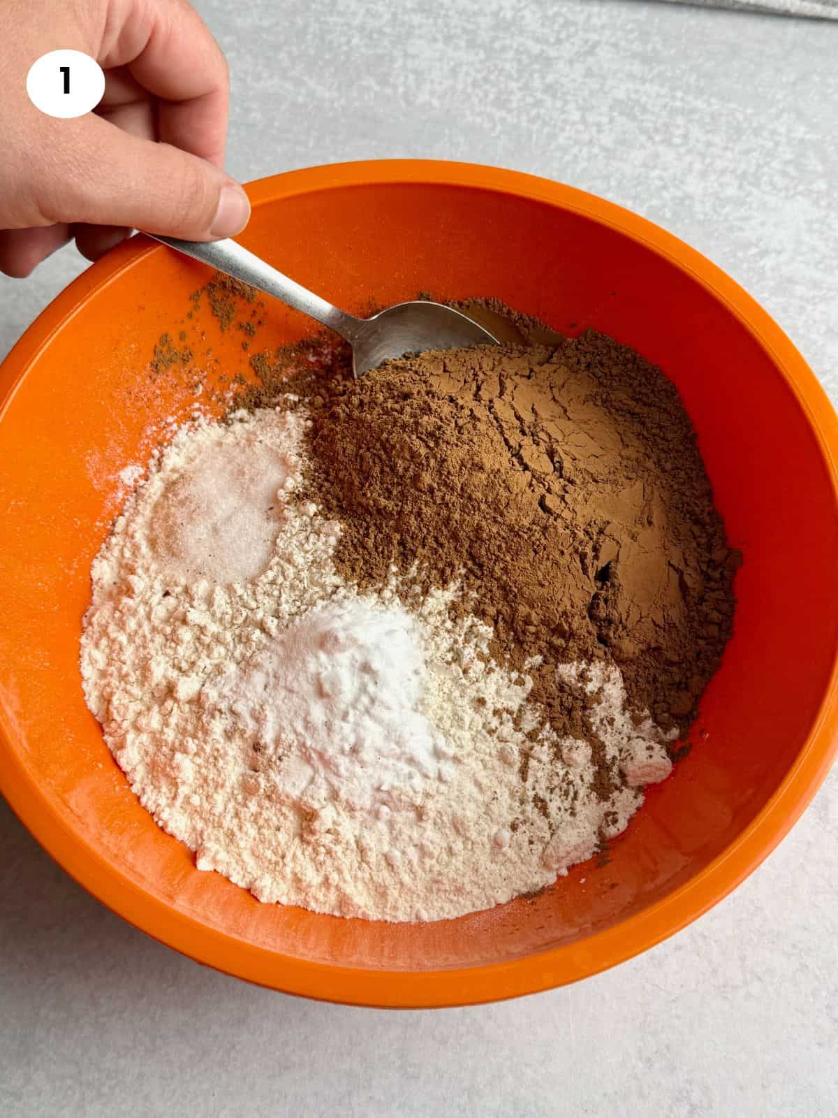 Mixing dry ingredients in a bowl.