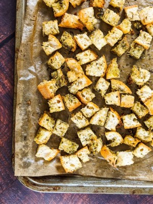 Homemade vegan croutons on a tray.